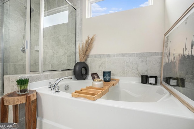 bathroom featuring a bath