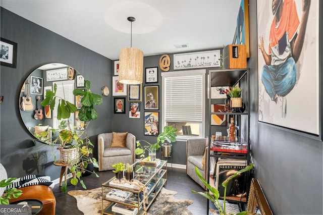 living area with dark hardwood / wood-style floors