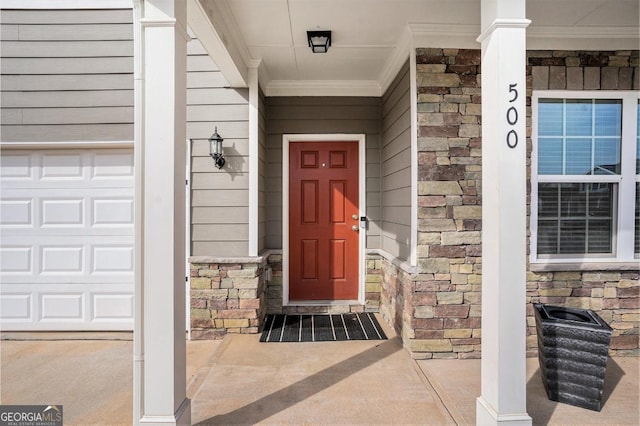 property entrance featuring a garage