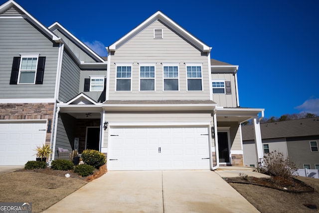 view of front of property featuring a garage