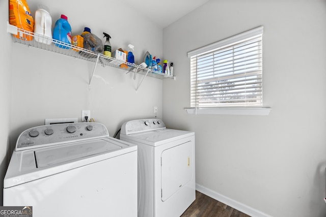 laundry area with washer and clothes dryer and dark hardwood / wood-style floors