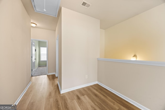 hall featuring light hardwood / wood-style floors