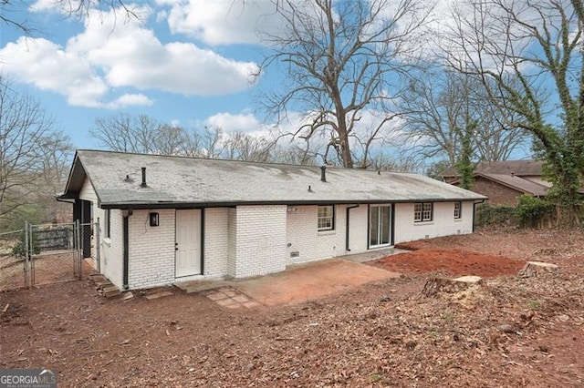 back of property featuring a patio