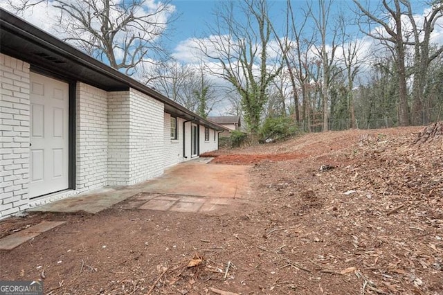 view of yard featuring a patio