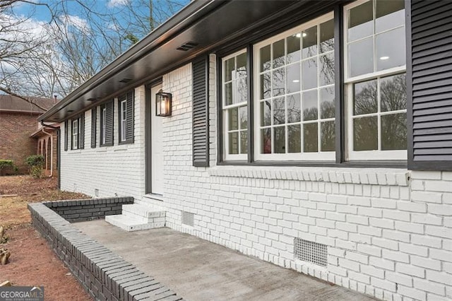 view of home's exterior with a patio area