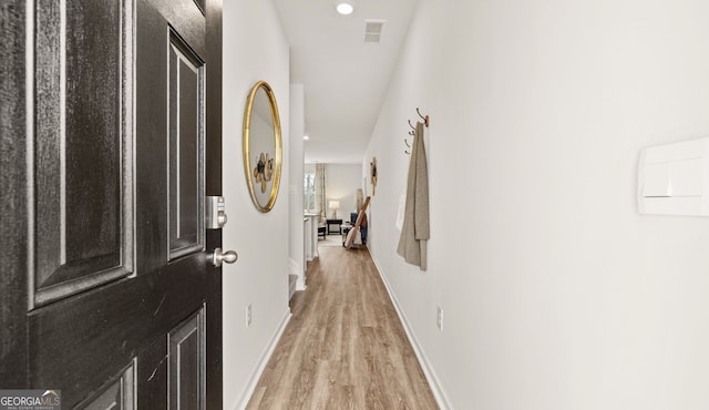 entrance foyer featuring light hardwood / wood-style floors