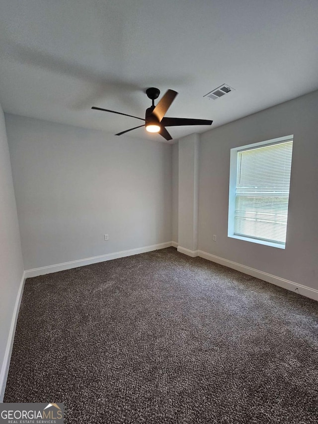 carpeted empty room with ceiling fan