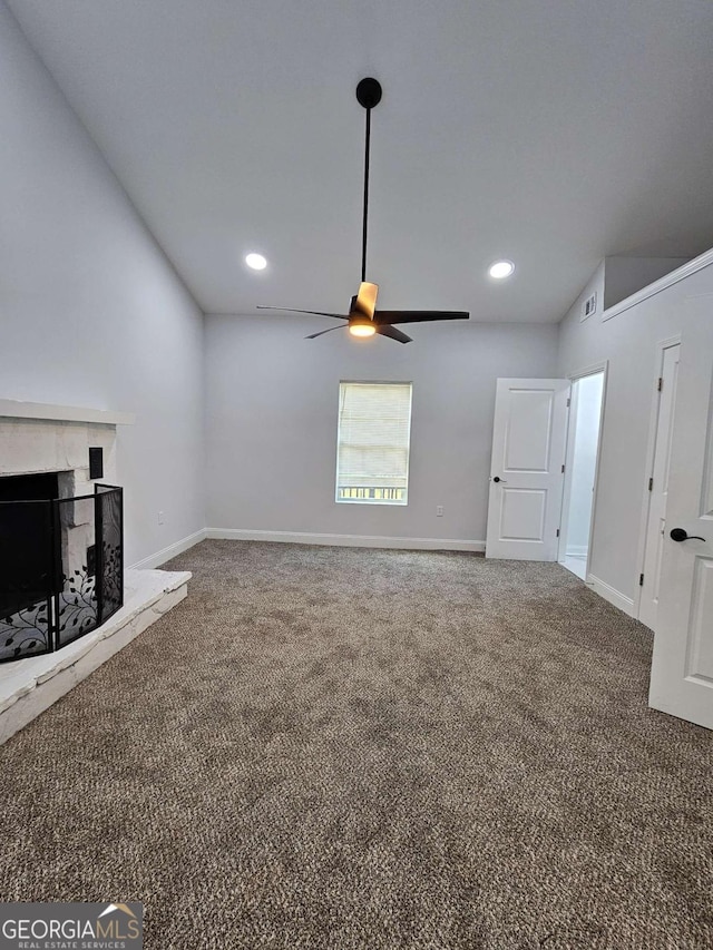 1295 Ga Highway 49, Macon, GA 31211 - unfurnished living room with carpet flooring, ceiling fan, baseboards, and a high end fireplace