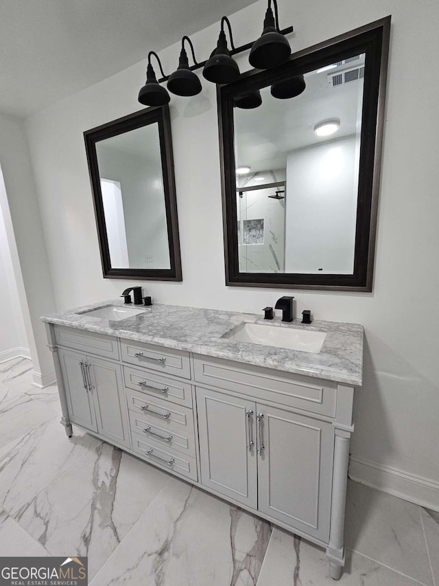 bathroom with vanity and a shower