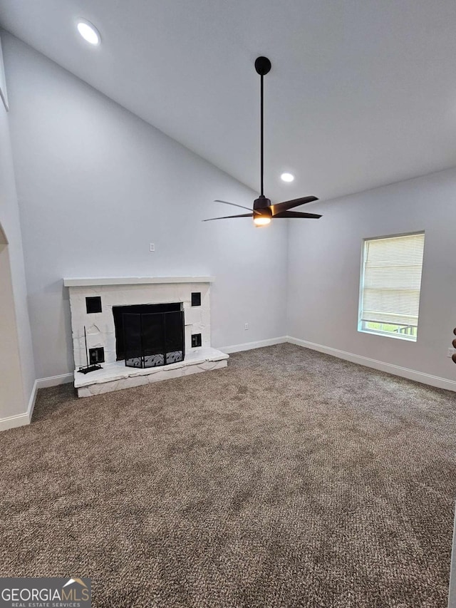 unfurnished living room featuring ceiling fan and carpet