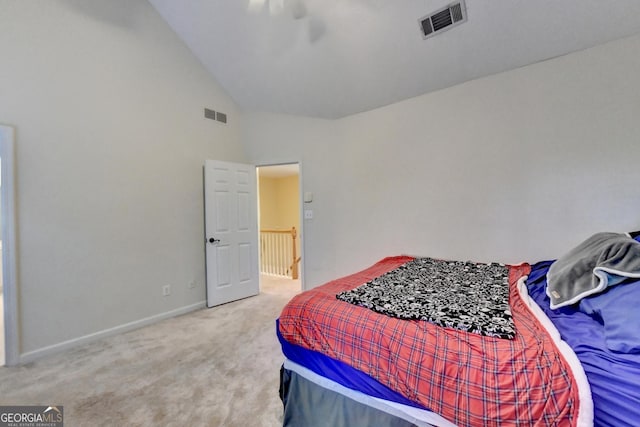 carpeted bedroom featuring ceiling fan and high vaulted ceiling