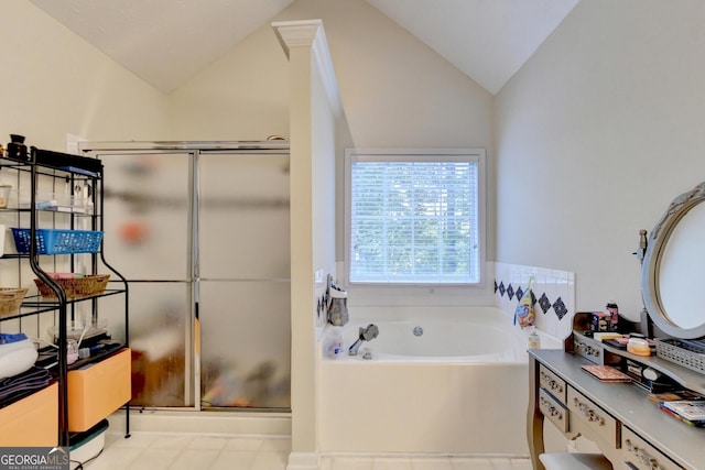 bathroom with lofted ceiling and a washtub