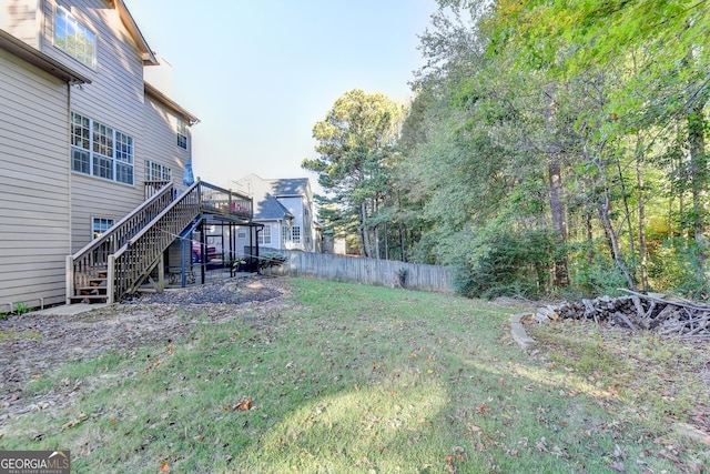 view of yard with a deck