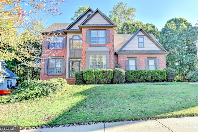 view of front of house with a front lawn