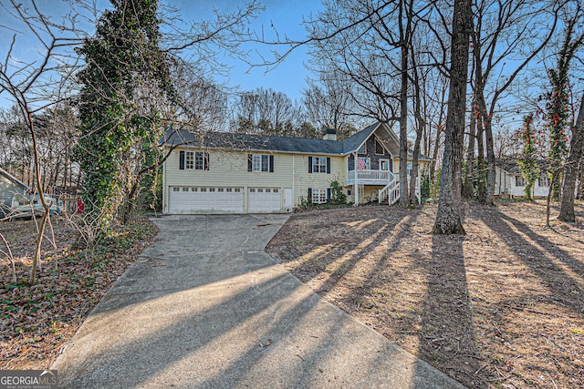 raised ranch featuring a garage