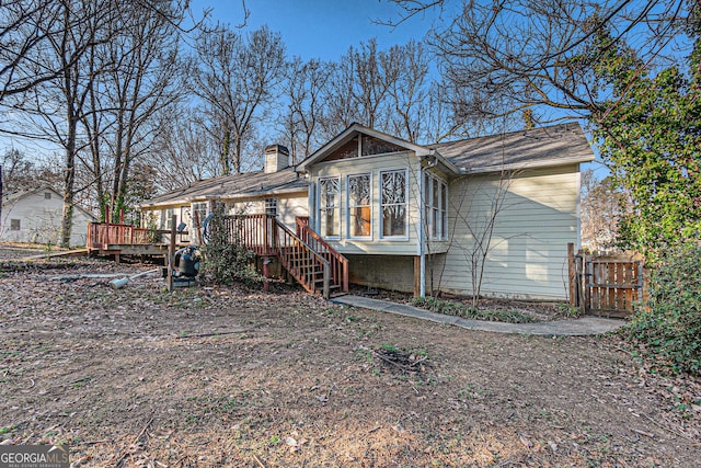 view of front of home with a wooden deck