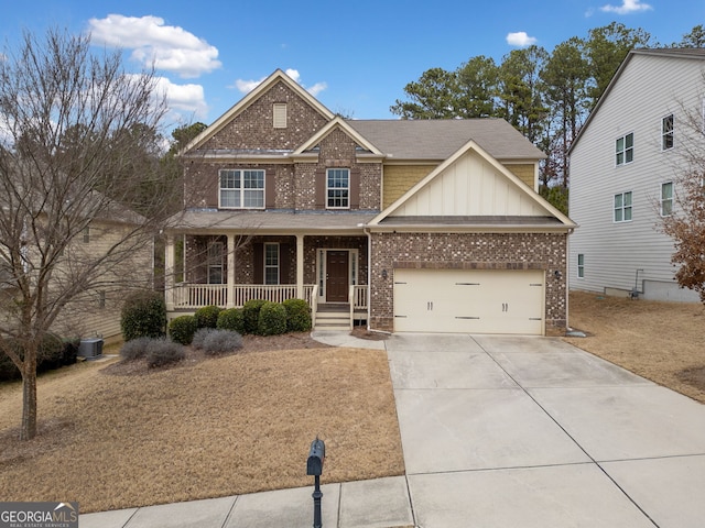 view of front of house with a porch and a garage