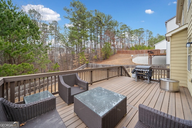 wooden terrace with area for grilling