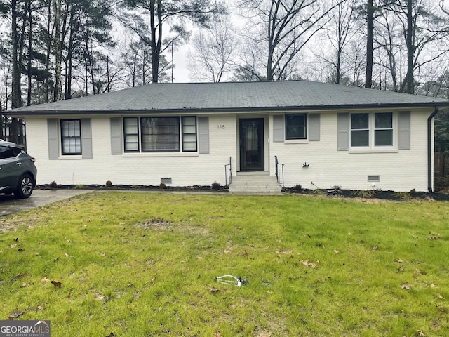 single story home with a front yard