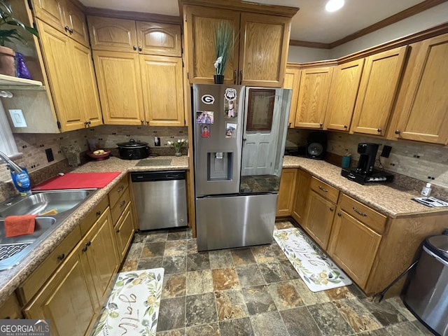 kitchen with stainless steel appliances, tasteful backsplash, sink, and ornamental molding