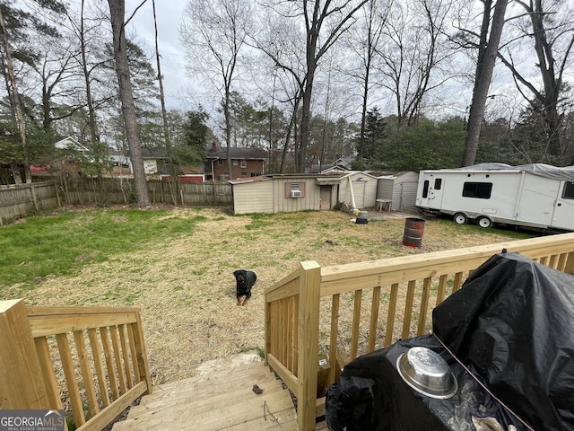 view of yard featuring a storage unit