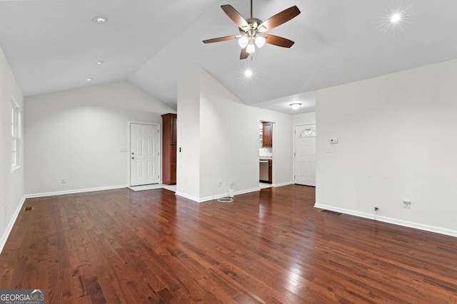 unfurnished living room with vaulted ceiling, ceiling fan, and dark hardwood / wood-style flooring