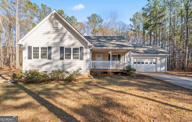 ranch-style home featuring a garage, a front lawn, and a porch