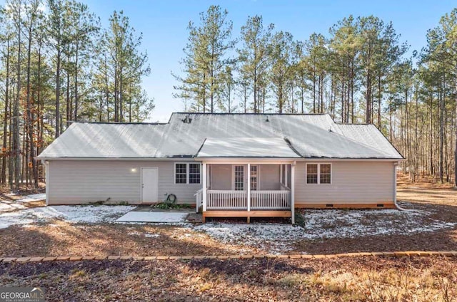 rear view of house with a patio