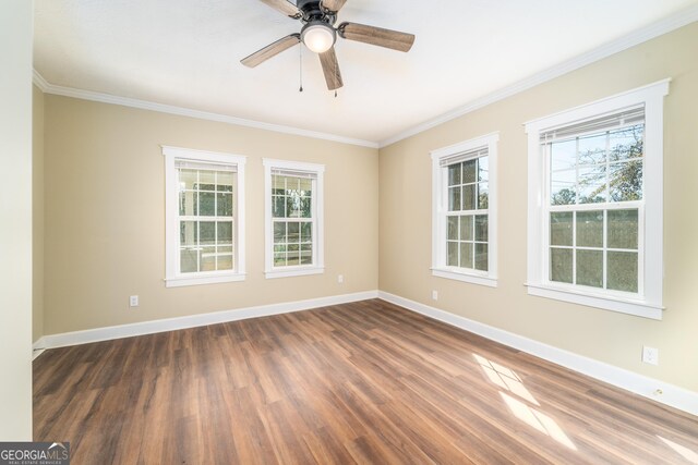 424 NW Central Ave, Blackshear, GA 31516 - back of house featuring a lawn, a fenced backyard, and metal roof