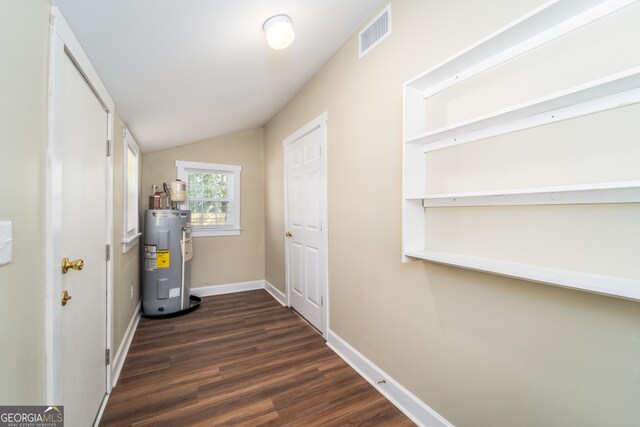 424 NW Central Ave, Blackshear, GA 31516 - unfurnished living room featuring baseboards, ornamental molding, wood finished floors, and ceiling fan with notable chandelier