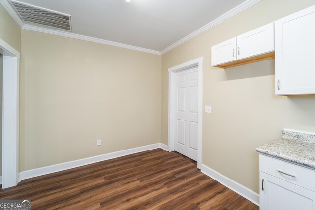 424 NW Central Ave, Blackshear, GA 31516 - full bathroom with baseboards, ornamental molding, wood finished floors, and toilet