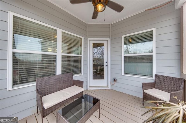 wooden terrace with ceiling fan