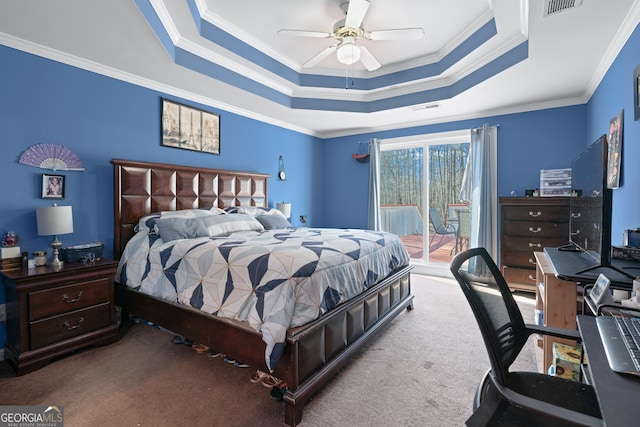 bedroom with crown molding, carpet flooring, access to outside, and a tray ceiling