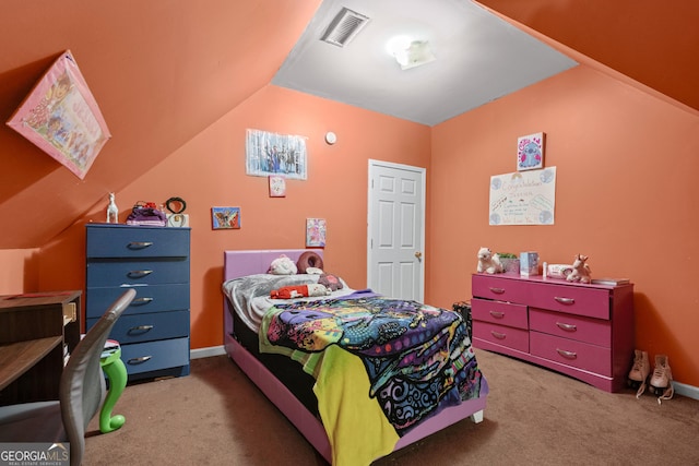 carpeted bedroom with vaulted ceiling