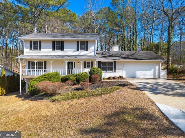 view of front of home featuring a garage and covered porch