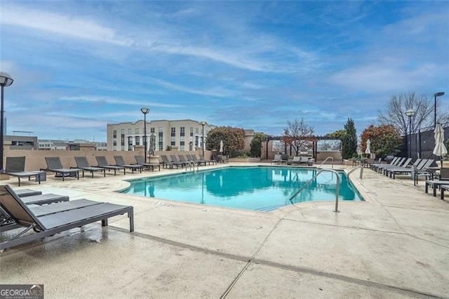 view of pool featuring a patio area