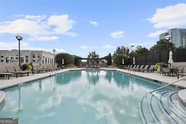 view of pool featuring a patio area