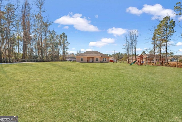 view of yard featuring a playground