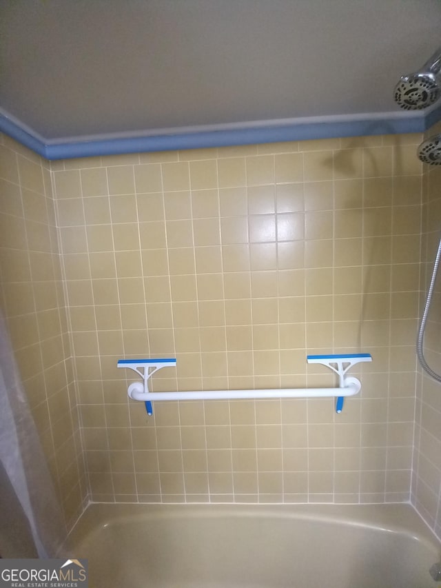 bathroom featuring bathing tub / shower combination