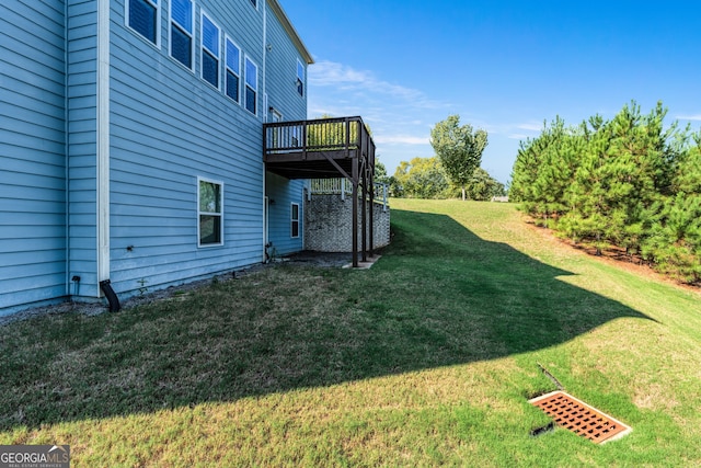 view of yard with a wooden deck