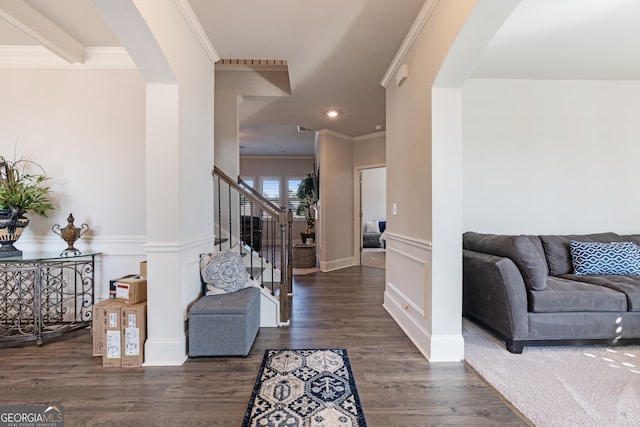 interior space with crown molding and dark hardwood / wood-style floors