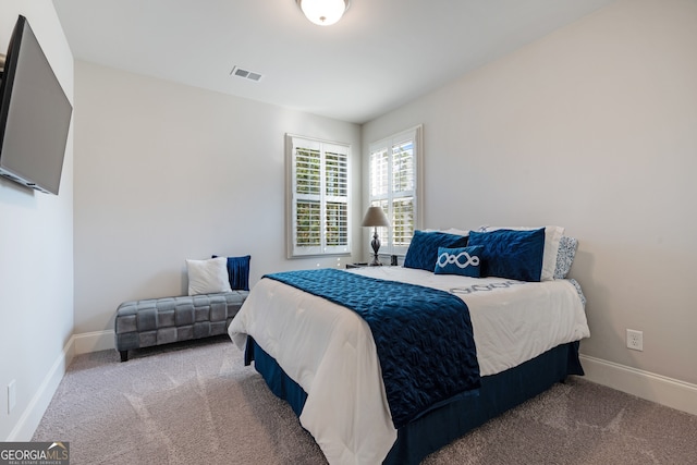 bedroom featuring carpet flooring