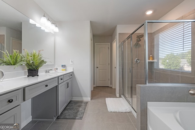 bathroom with vanity, separate shower and tub, and tile patterned floors