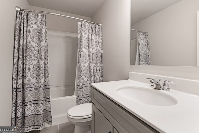 full bathroom featuring shower / tub combo with curtain, vanity, and toilet