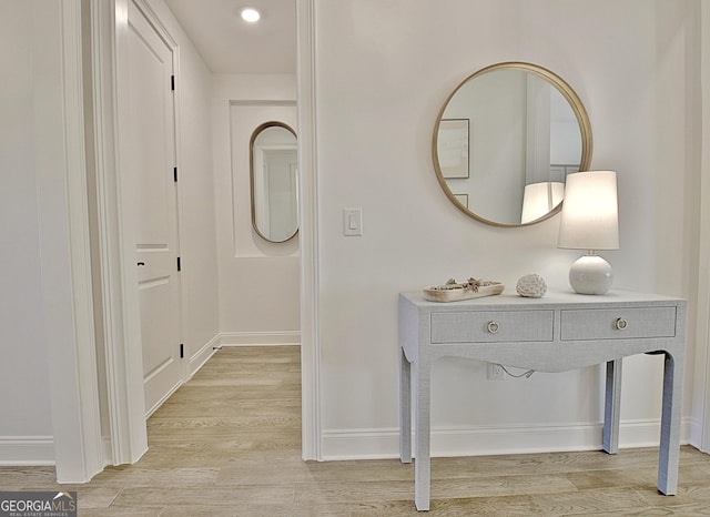 hallway featuring light wood-type flooring