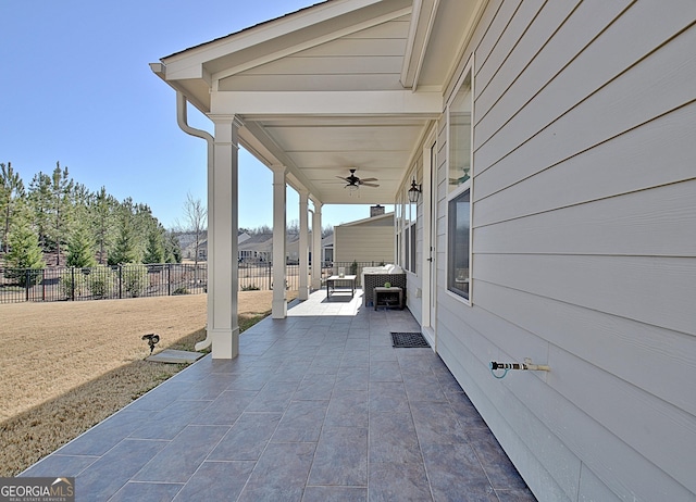 view of patio / terrace featuring ceiling fan