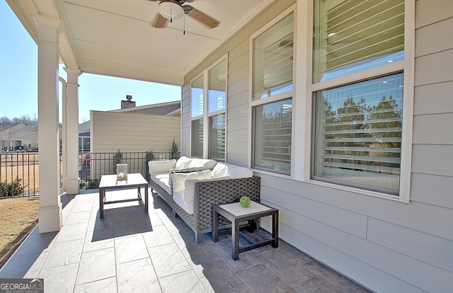 view of patio featuring an outdoor hangout area and ceiling fan