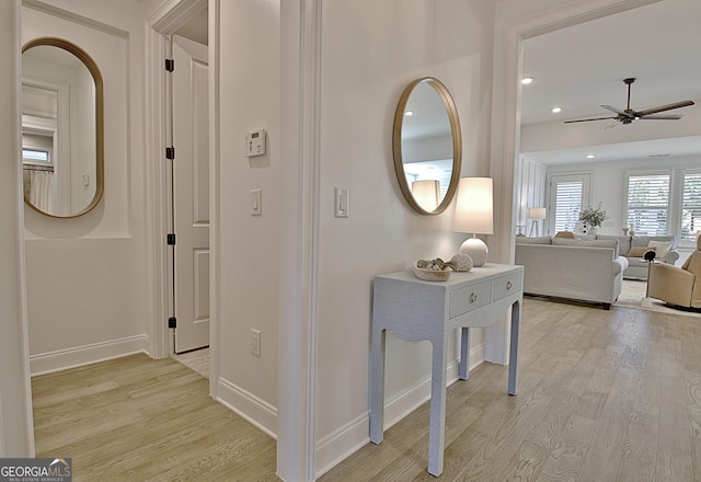 hall with light wood-type flooring