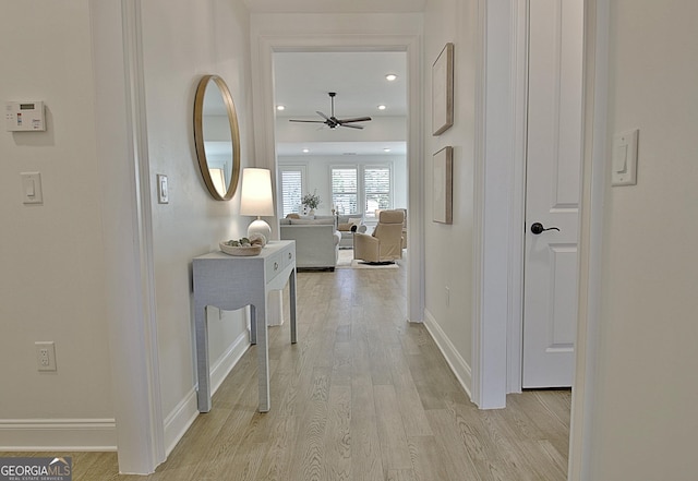 hallway featuring light hardwood / wood-style flooring