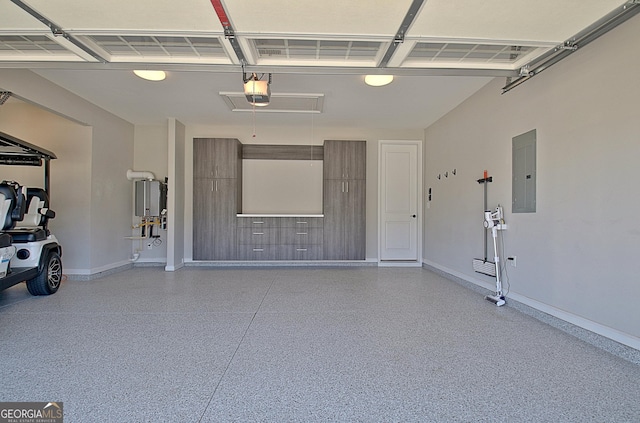 garage with a garage door opener, electric panel, and water heater